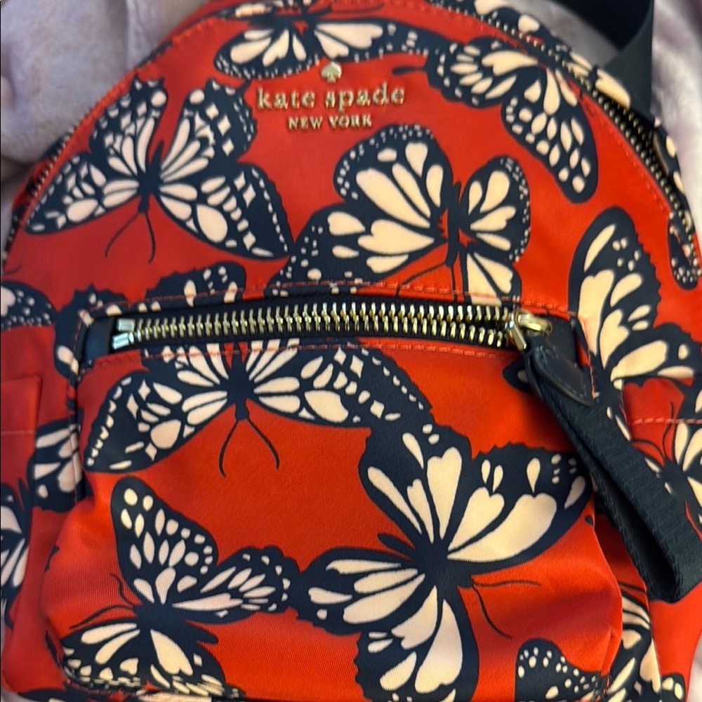 Kate Spade Red and Black Backpack with Butterfly Design